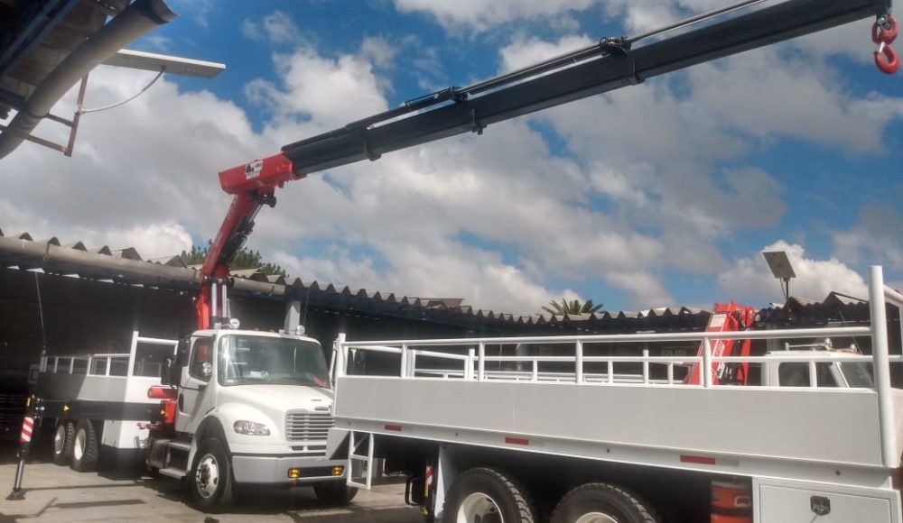 Three-Fassi-F385A-2-24-e-dynamic-articulated-cranes-installed-on-Torton-trucks-by-Eurogru-MX-3